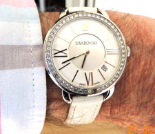 Montre   SWAROVSKI QUARTZ LUNETTE SERTIE    /  FONCTIONNE PILE NEUVE  SWISS MADE