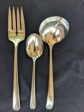 ladle, fork, and spoon