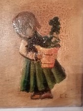 poly chrom petite fille avec un  pot de fleur signé CC encadré 30x20 cm A.Spitz.