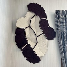 Sculpture murale en carreaux