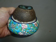 Pyrogène Longwy avec son grattoir.