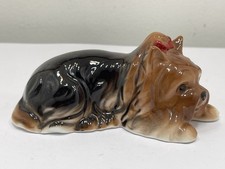 Figurine en porcelaine chien