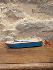 Ancien jouet tôle mécanique bateau police Western Germany schuco, MS
