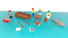 Lot Lego ancien pirates figurines canon bateau singe requin coffre drapeau
