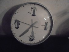 Pendule murale métallique