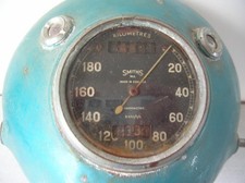 Ancien phare de moto compteur