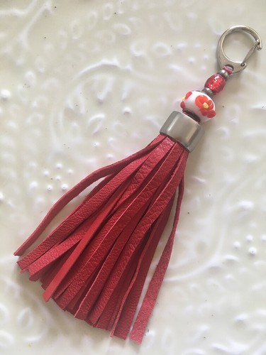 Pompon bijou collier - de, de