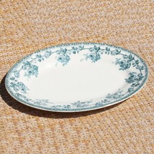 Ancien plat rond en faïence