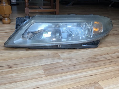 Phare optique xenon gauche - ,