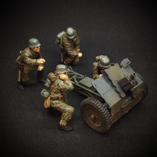 Canon 7,5 le.IG 18 et servants - maquette montée et peinte 1/35