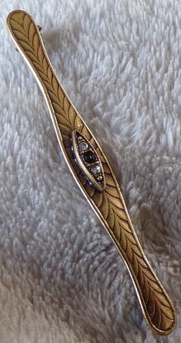 Broche plaqué zircon et - or,