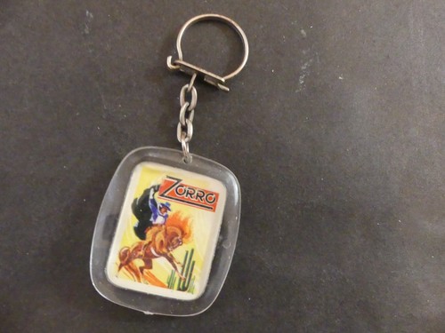 Porte clé journal bandes - journal,