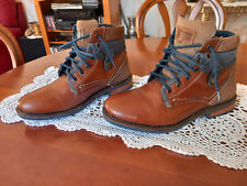 paire de bottine homme , pointure 41 , couleur cognac , jamais porter . NEUVE .