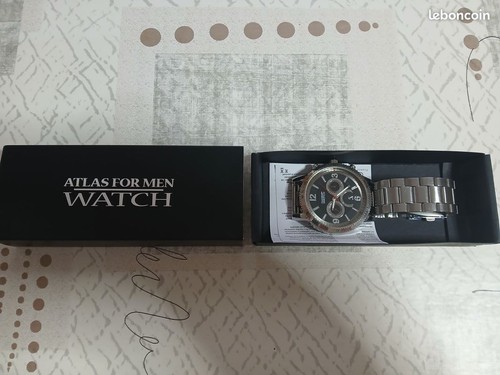 Vends montre quartz pour - à,