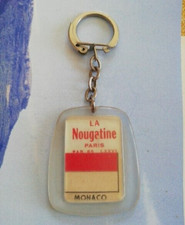 PORTE CLES publicitaire PLASTIQUE LA NOUGATINE PARIS MONACO ITALIE