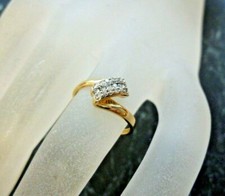 Bague en or jaune 18 K sertie