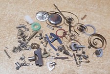 Lot pièce horlogerie de précision engrenage montre bouton reveil divers lot n 70