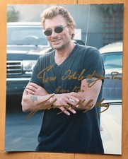 JOHNNY HALLYDAY. DÉDICACE AUTOGRAPHE SUR PHOTO MARCHANDISING. FORMAT 24X30