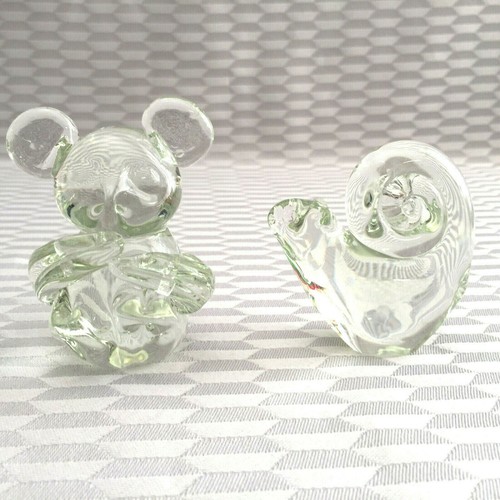 Deux figurines sculptures - deux,