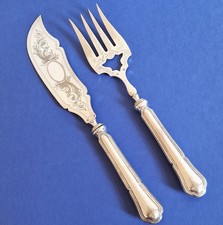Ancien couvert de service pour poisson en métal argenté poinçonné.