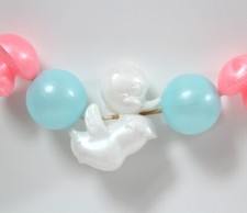 Jouet de poussette hochet ancien