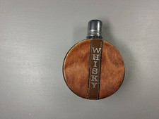 Flasque à whisky vintage ,made in Italie en inox , gainée de peau de vache