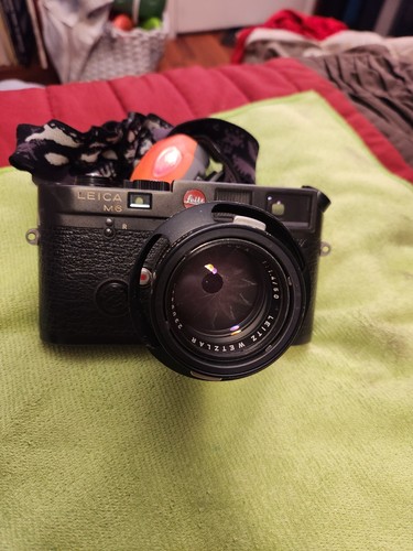 Leica with tele lense - with,
