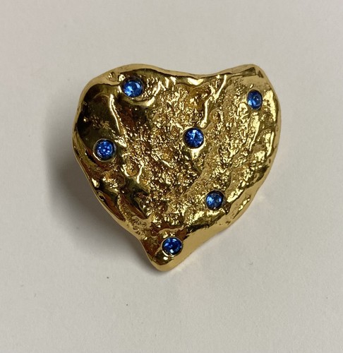 Broche pin yves saint - pin's,