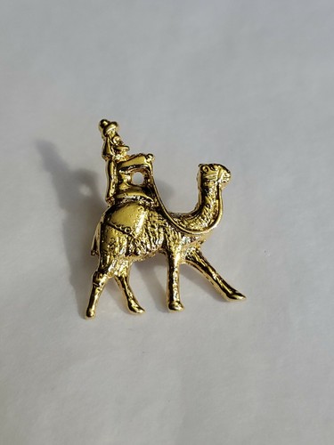 Camel and rider - and, lapel