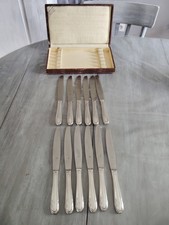12 couteaux métal argenté poinçon O.C tête de cheval Christofle et couronne