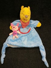 Doudou marionnette Winnie l'ourson Disneyland  Etat neuf