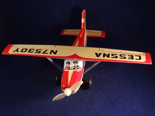 Ancien jouet avion mécanique