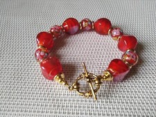 bracelet perles de murano milflori rouge et perle de murano faite au chalumeau 