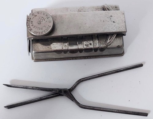 Ancien chauffe fer friser - à,