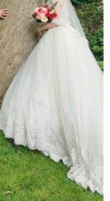 robe de mariée princesse porté une fois neuf taille de 36-42 avec un soulier 