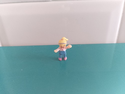 Polly pocket figurine doll