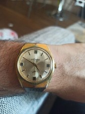 Montre Newton mecanique Manuel Plaque or Fonctionne