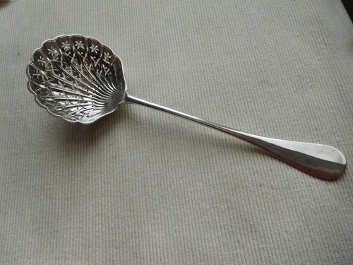 Cuillere saupoudrer en - a,