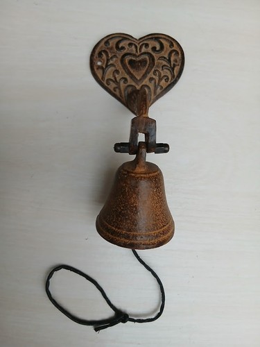 Jolie cloche murale bronze - en,
