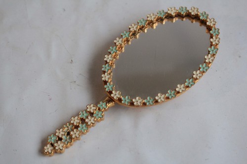 Miroir face main fleurs - face,