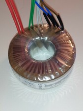 Transformateur Torique Prim. 230 volts Sec. 2 x 300 v - 2x 6 v Voir descriptif