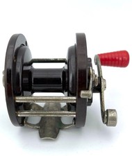 Moulinet de pêche en bakelite marron , marque Penn, made in USA, années 1950s