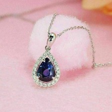 Pendentif halo saphir bleu