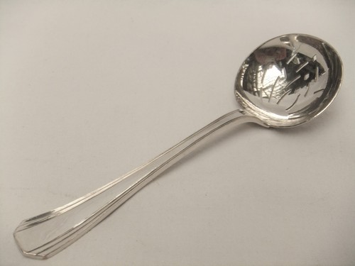 Cuillère saupoudreuse