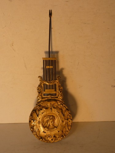 Balancier ancien bronze doré