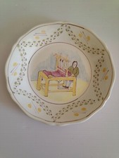 superbe assiette  en FAIENCE MOULIN  DES LOUPS NORD THEME LE TISSEUR 