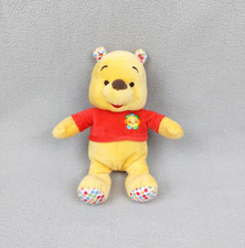 Peluche doudou Winnie l’ourson 25 cm Disney Nicotoy tee-shirt rouge fleur pois