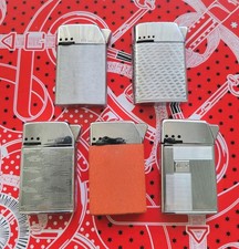 SIM LUXE. 5 ANCIENS BRIQUETS