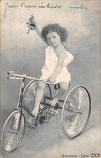 CPA FANTAISIE REPRESENTANT UN BEBE A TRICYCLE VELO