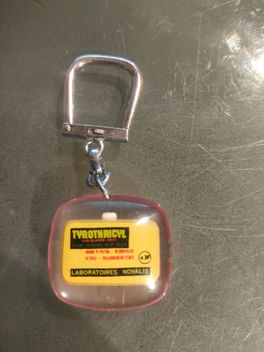 Antique bourbon key fob - key,
